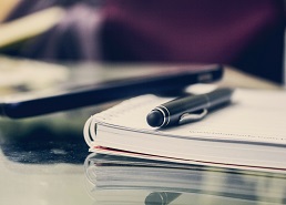 Stock image of pen on notebook