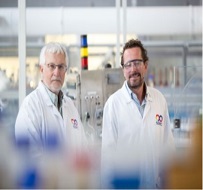 Image of Prof.s Michael Zaworotko and Gavin Walker (scientific directors of SPCC) in lab attire